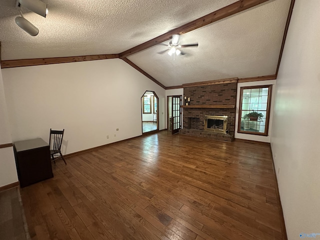 2008 Oakleaf Ln, Arab, AL 35016 - unfurnished living room featuring wood-type flooring, a textured ceiling, ceiling fan, and baseboards