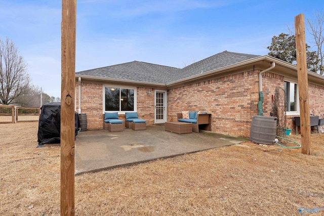 back of property featuring a patio area