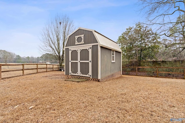 view of outbuilding with a rural view