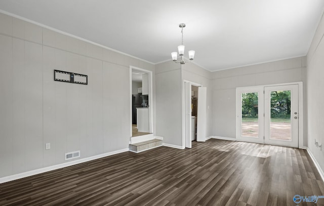 interior space featuring a chandelier, crown molding, and dark wood-type flooring