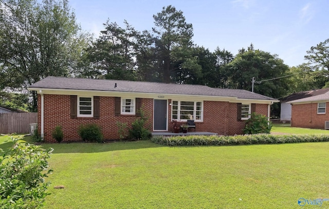 single story home with a front yard