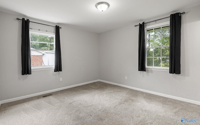 view of carpeted spare room