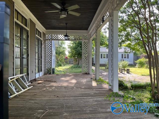 wooden terrace with ceiling fan