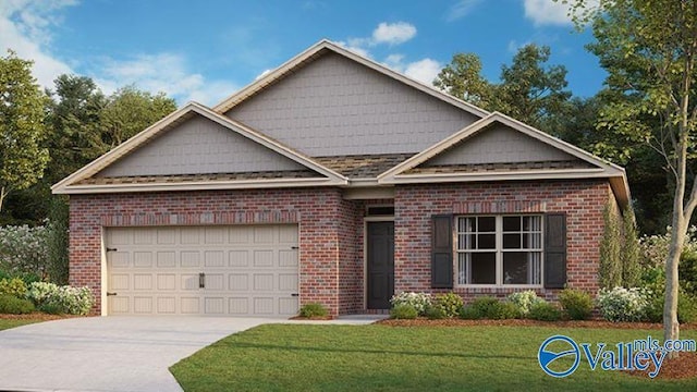16 Moon Dr, Scottsboro, AL 35769 - view of front of house with concrete driveway, a garage, a front lawn, and brick siding