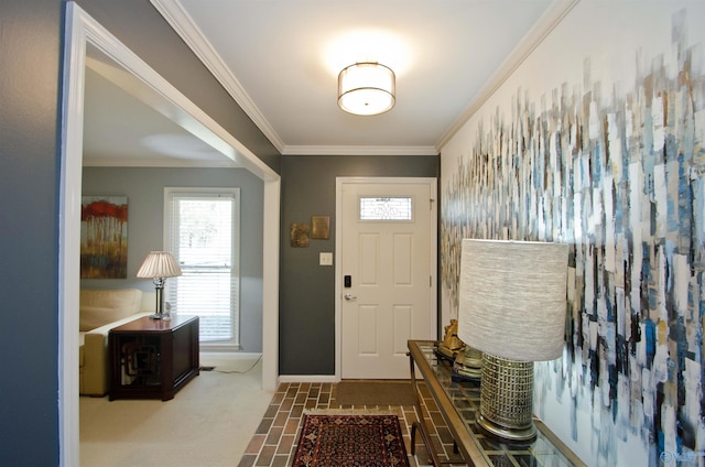 entryway featuring baseboards and crown molding