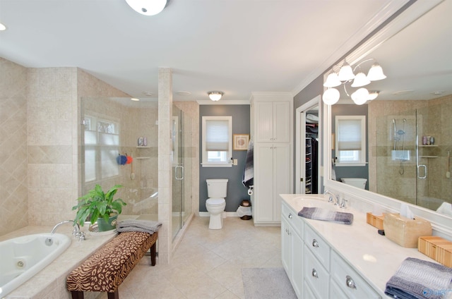 full bath featuring a stall shower, a tub with jets, toilet, and vanity