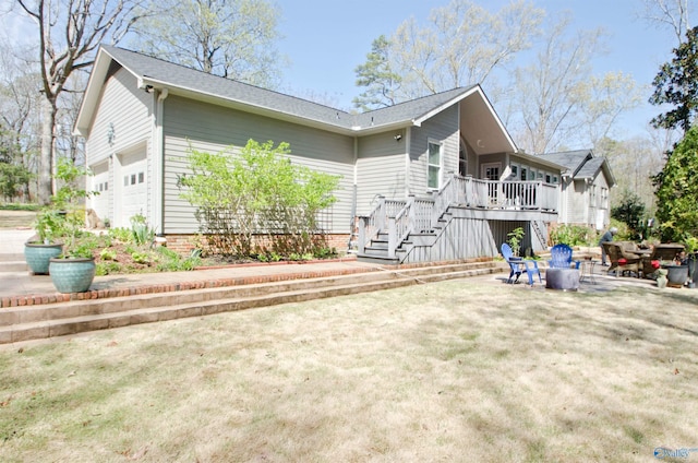 view of home's exterior with stairway and a deck