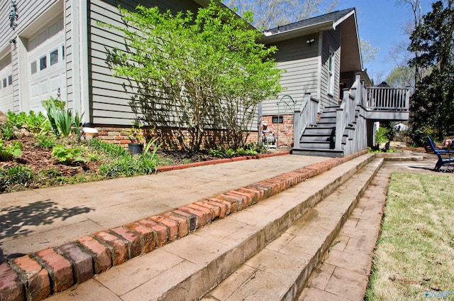 view of home's exterior with stairway