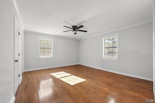 unfurnished room with light hardwood / wood-style floors, ceiling fan, and crown molding