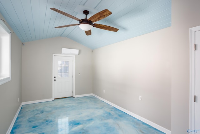 empty room featuring lofted ceiling, concrete floors, a wall unit AC, ceiling fan, and wooden ceiling