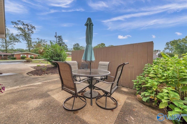 view of patio featuring outdoor dining area