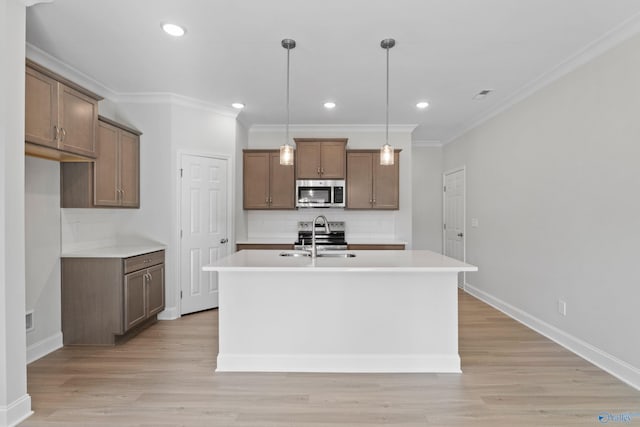 2159 Dawson Ln NE, Cullman, AL 35058 - kitchen with a sink, light countertops, an island with sink, stainless steel appliances, and tasteful backsplash