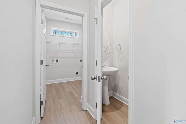 2159 Dawson Ln NE, Cullman, AL 35058 - bathroom with baseboards and wood finished floors