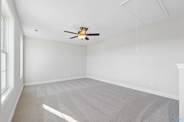2159 Dawson Ln NE, Cullman, AL 35058 - carpeted empty room with visible vents, attic access, baseboards, and ceiling fan
