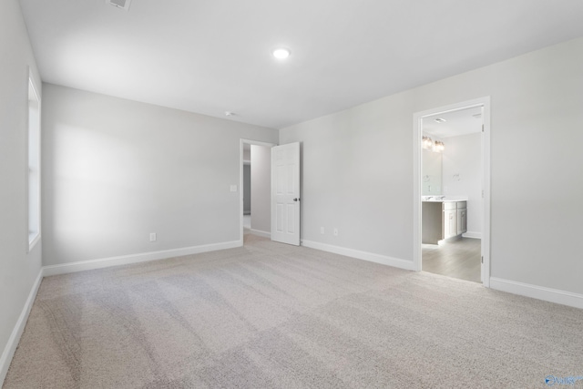 2159 Dawson Ln NE, Cullman, AL 35058 - unfurnished bedroom with baseboards and light carpet