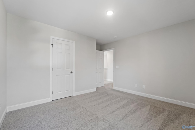 2159 Dawson Ln NE, Cullman, AL 35058 - unfurnished bedroom featuring baseboards and carpet