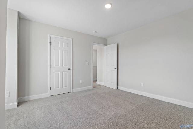 2159 Dawson Ln NE, Cullman, AL 35058 - unfurnished bedroom with baseboards and carpet