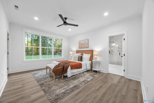bedroom with baseboards, recessed lighting, and wood finished floors