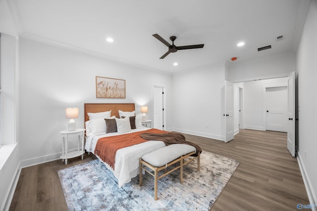 bedroom with dark wood-type flooring and ceiling fan