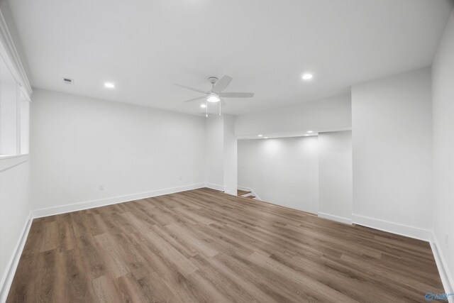 empty room featuring a ceiling fan, recessed lighting, and wood finished floors