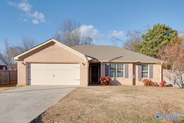 single story home featuring a garage and a front lawn