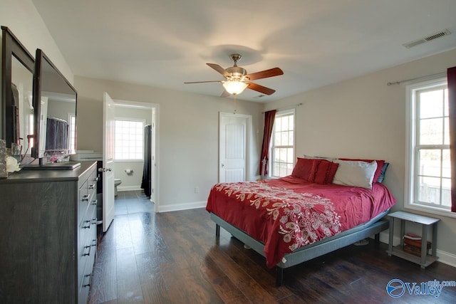 bedroom with dark hardwood / wood-style floors and ceiling fan