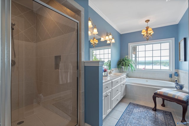 bathroom with tile patterned floors, a notable chandelier, independent shower and bath, and vanity