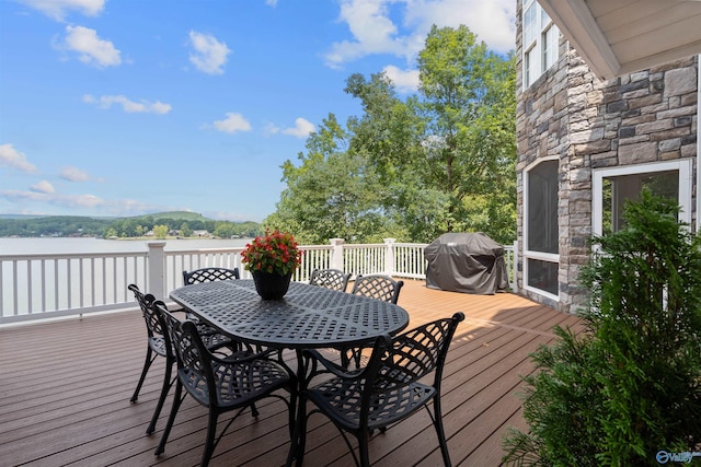 wooden terrace with grilling area