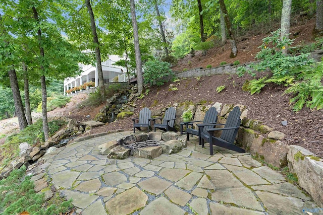 view of patio with an outdoor fire pit