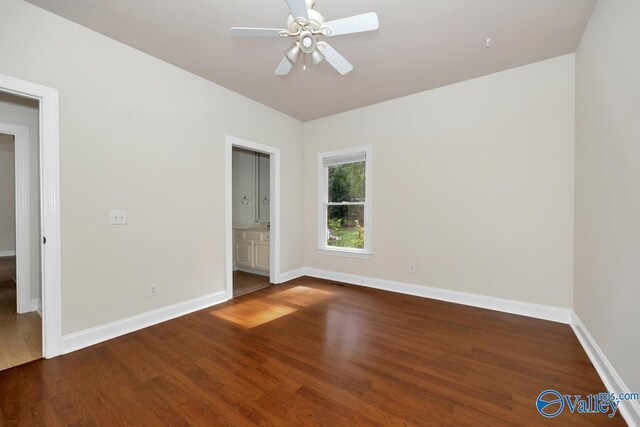 118 Conservancy Dr, Madison, AL 35758 - unfurnished bedroom featuring wood finished floors, ensuite bath, and a ceiling fan