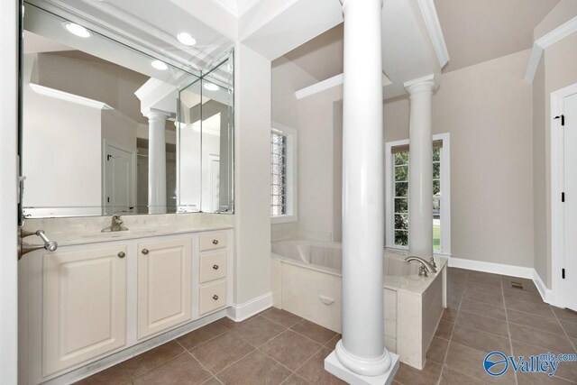 118 Conservancy Dr, Madison, AL 35758 - full bath with ornate columns, a garden tub, vanity, tile patterned floors, and recessed lighting