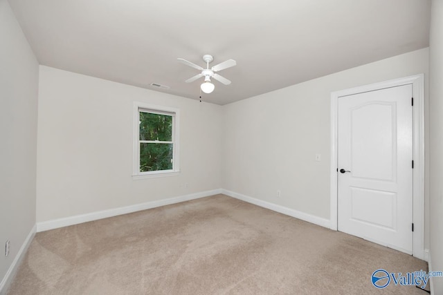 118 Conservancy Dr, Madison, AL 35758 - carpeted spare room featuring a ceiling fan and baseboards