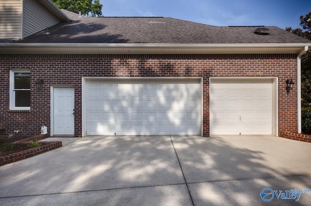 118 Conservancy Dr, Madison, AL 35758 - garage featuring driveway