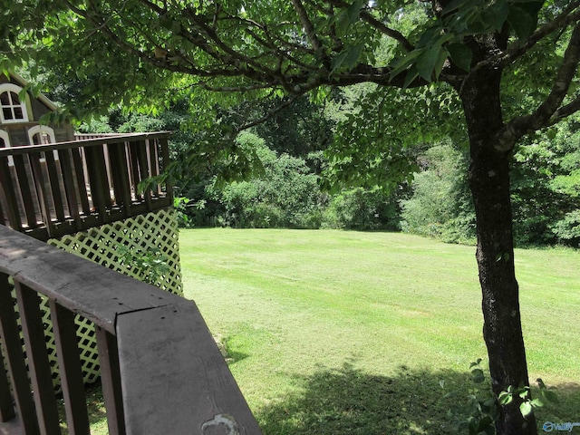 109 Colonial Dr, Scottsboro, AL 35768 - view of yard featuring a deck