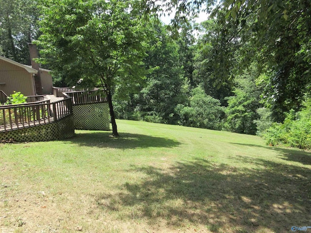 109 Colonial Dr, Scottsboro, AL 35768 - view of yard featuring a deck
