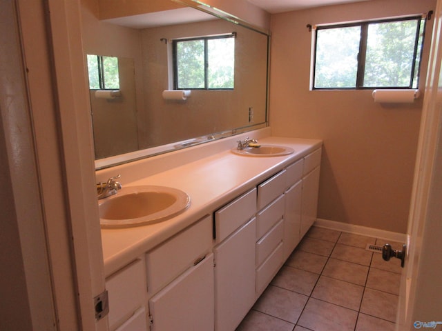 109 Colonial Dr, Scottsboro, AL 35768 - full bathroom with double vanity, baseboards, a sink, and tile patterned floors