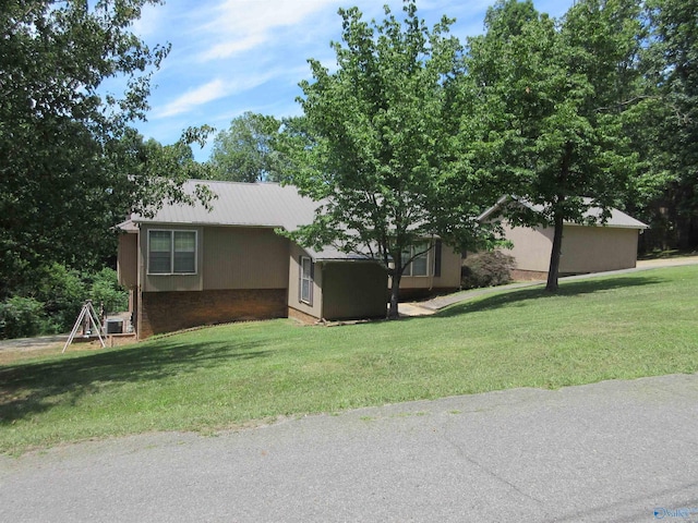 109 Colonial Dr, Scottsboro, AL 35768 - ranch-style home with a front lawn
