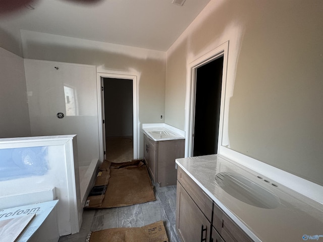 bathroom featuring a tub to relax in
