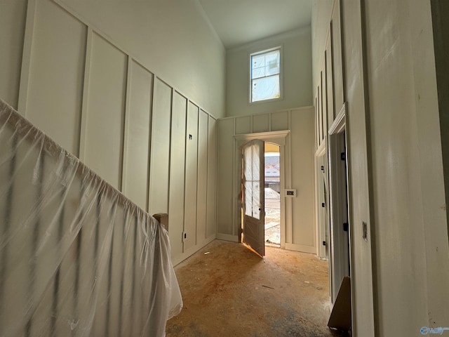 interior space with a towering ceiling