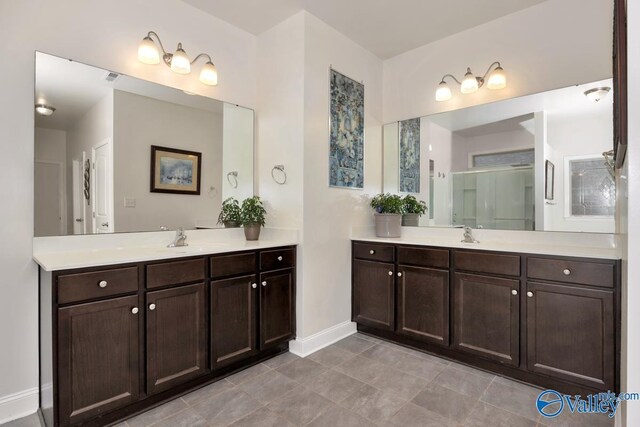 bathroom with vanity and an enclosed shower