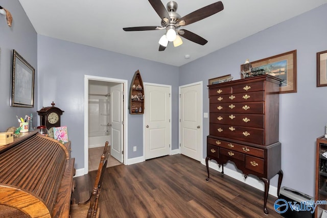 interior space featuring dark wood-type flooring and ceiling fan