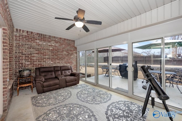 sunroom / solarium with ceiling fan