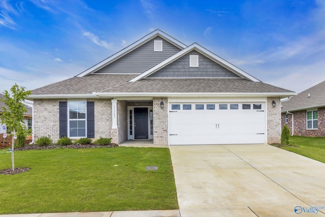 craftsman-style home with a garage and a front yard