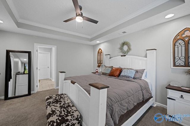 713 Rabbittown Rd, Glencoe, AL 35905 - carpeted bedroom featuring a tray ceiling, ornamental molding, recessed lighting, baseboards, and a ceiling fan