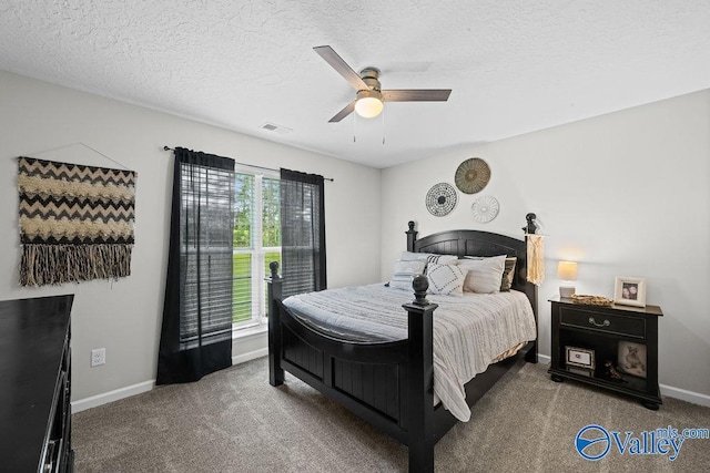 713 Rabbittown Rd, Glencoe, AL 35905 - bedroom with carpet flooring, baseboards, a textured ceiling, and ceiling fan