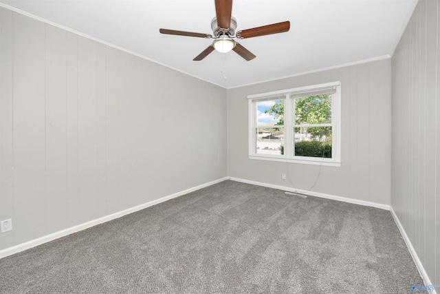 2501 Andrew Jackson Way NE, Huntsville, AL 35811 - carpeted spare room with visible vents, ornamental molding, baseboards, and ceiling fan