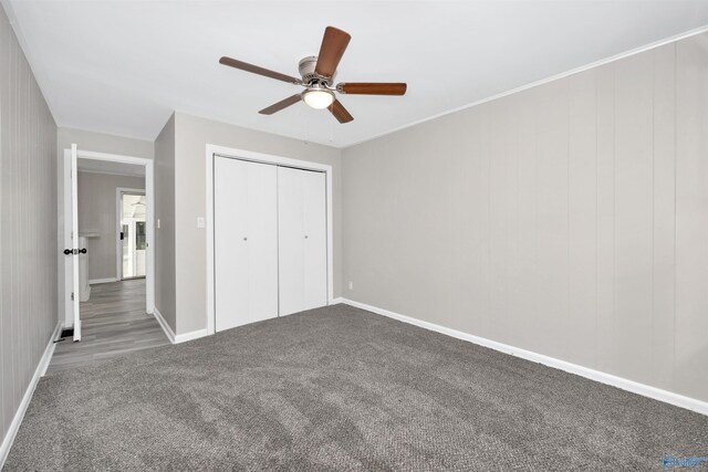 2501 Andrew Jackson Way NE, Huntsville, AL 35811 - unfurnished bedroom featuring carpet floors, a closet, a ceiling fan, and baseboards