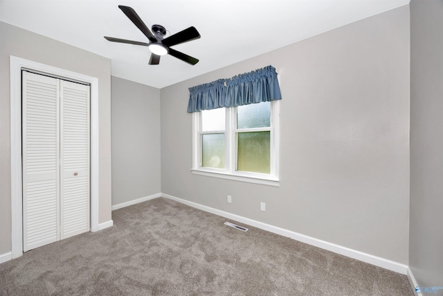 2501 Andrew Jackson Way NE, Huntsville, AL 35811 - unfurnished bedroom featuring baseboards, carpet flooring, visible vents, and a closet