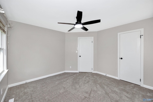 2501 Andrew Jackson Way NE, Huntsville, AL 35811 - carpeted empty room with ceiling fan and baseboards