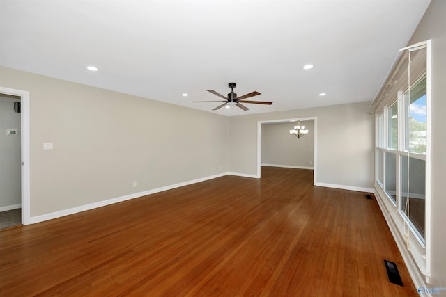 2501 Andrew Jackson Way NE, Huntsville, AL 35811 - unfurnished room with baseboards, visible vents, recessed lighting, ceiling fan with notable chandelier, and wood finished floors